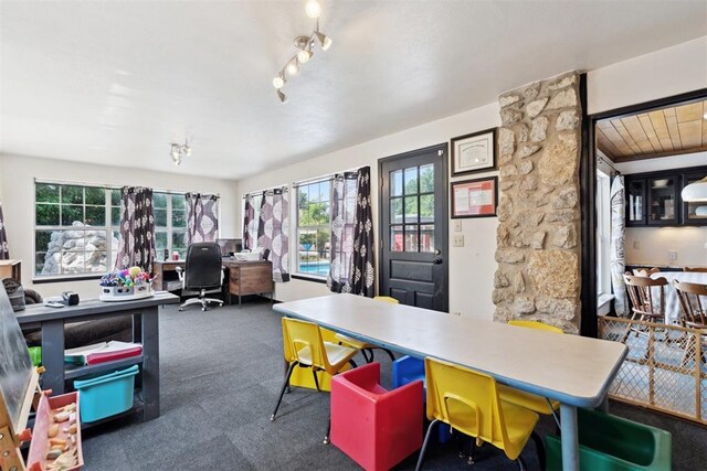 2208 Amber Rd, Oklahoma City, OK 73170 - carpeted dining space with an office area