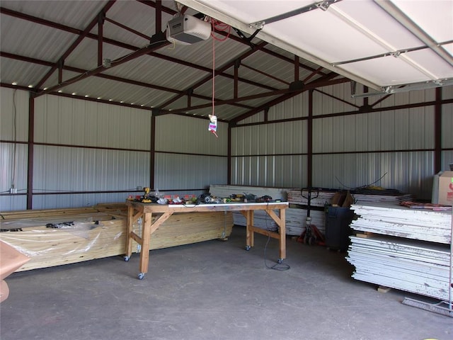 37950 W Macarthur St, Shawnee, OK 74804 - garage with metal wall and a garage door opener