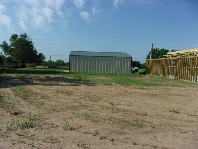 37950 W Macarthur St, Shawnee, OK 74804 - view of yard featuring an outbuilding and an outdoor structure