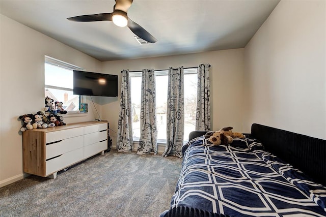 4420 Trophy Dr, Norman, OK 73072 - carpeted bedroom with a ceiling fan