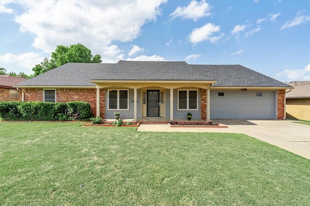 2309 NW 119th St, Oklahoma City, OK 73120 - single story home featuring concrete driveway, a garage, a front yard, brick siding, and a shingled roof