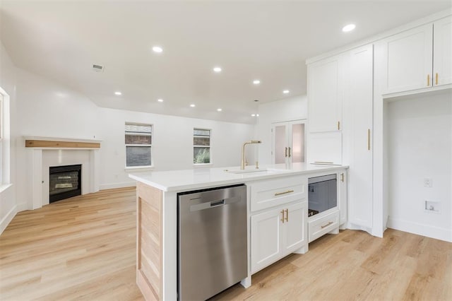 2016 NW 172nd St, Edmond, OK 73012 - kitchen featuring dishwasher, a sink, light wood finished floors, white cabinetry, and recessed lighting