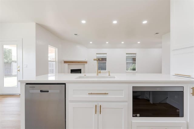 2016 NW 172nd St, Edmond, OK 73012 - kitchen with dishwasher, white cabinetry, open floor plan, light countertops, and recessed lighting