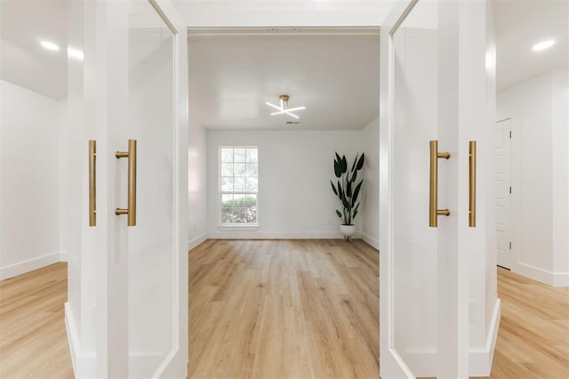 2016 NW 172nd St, Edmond, OK 73012 - hallway with light wood-style flooring and baseboards