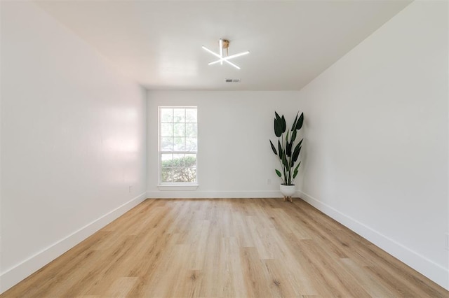 2016 NW 172nd St, Edmond, OK 73012 - spare room featuring light wood finished floors and baseboards