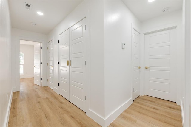 2016 NW 172nd St, Edmond, OK 73012 - hall featuring light wood-style floors, baseboards, and recessed lighting