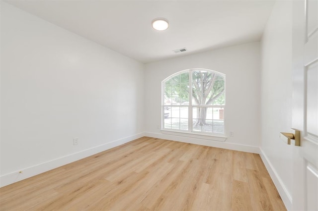 2016 NW 172nd St, Edmond, OK 73012 - spare room with light wood-style floors and baseboards