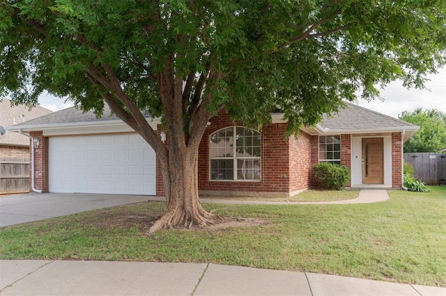 2016 NW 172nd St, Edmond, OK 73012 - view of front of house with driveway, brick siding, a garage, and roof with shingles