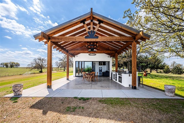 18800 NE 122nd St, Jones, OK 73049 - view of patio with a gazebo and exterior kitchen