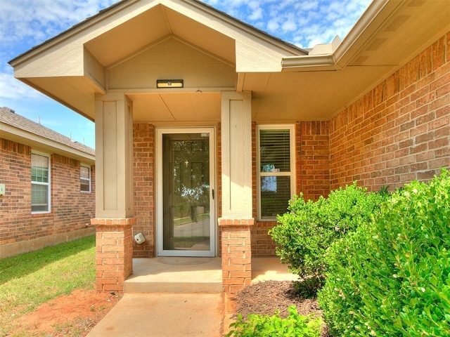 19901 Adagio Ln, Edmond, OK 73012 - view of exterior entry with brick siding