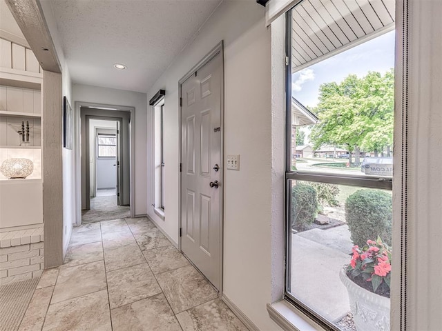 13613 Pin Oak, Edmond, OK 73013 - entrance foyer featuring a textured ceiling and recessed lighting