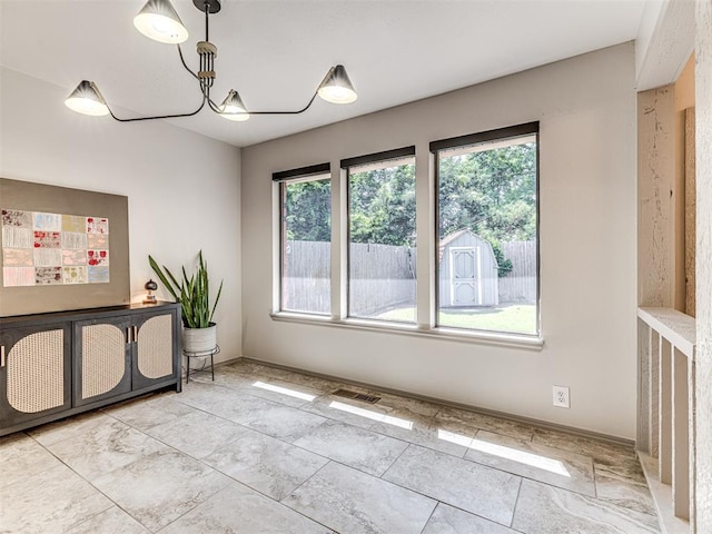 13613 Pin Oak, Edmond, OK 73013 - spare room featuring healthy amount of natural light
