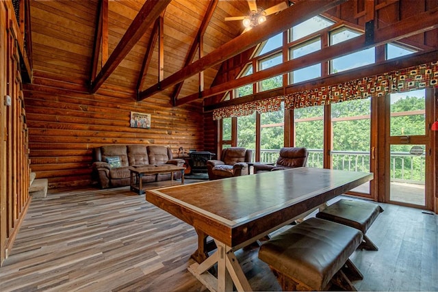 1000 N Canadian Ave, Purcell, OK 73080 - dining area with wooden ceiling with exposed beams, a towering ceiling, wood-type flooring, and ceiling fan