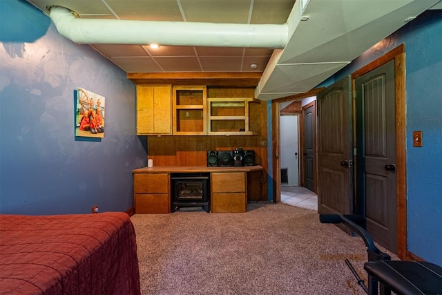 1000 N Canadian Ave, Purcell, OK 73080 - bedroom featuring light colored carpet, beverage cooler, and a paneled ceiling