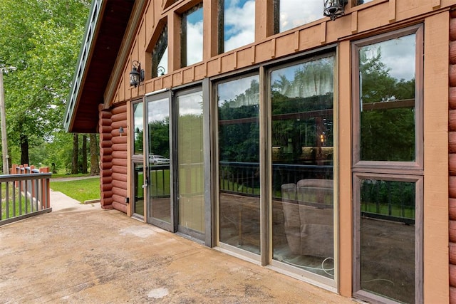 1000 N Canadian Ave, Purcell, OK 73080 - doorway to outside featuring a towering ceiling