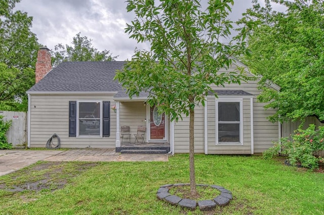 912 E Comanche St, Norman, OK 73071 - view of front of property with a chimney and roof with shingles