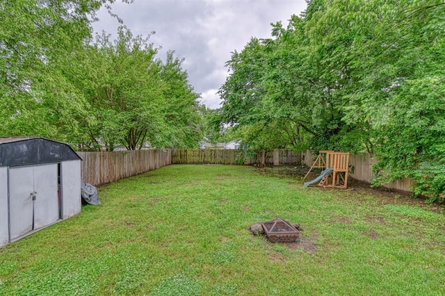 912 E Comanche St, Norman, OK 73071 - view of yard featuring an outdoor fire pit