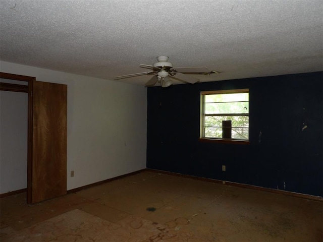 8317 NW 27th St, Bethany, OK 73008 - spare room featuring a textured ceiling, ceiling fan, and baseboards