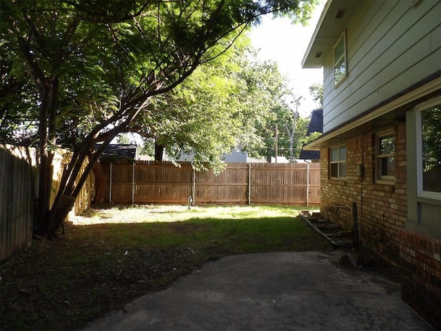8317 NW 27th St, Bethany, OK 73008 - view of yard featuring a patio area
