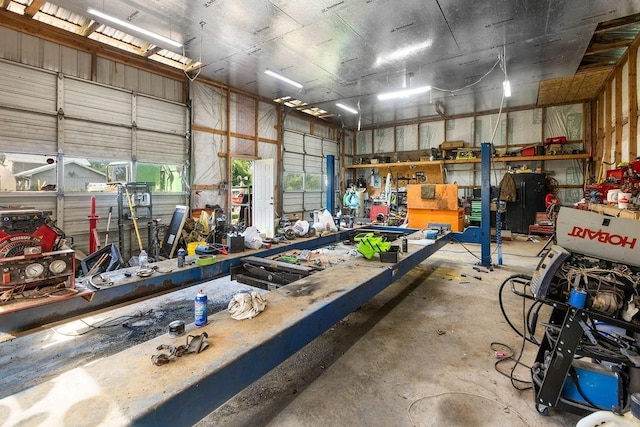 2645 E 2090th Rd, Hugo, OK 74743 - garage featuring a workshop area