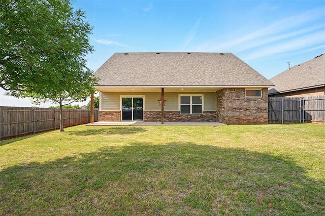 8332 NW 139 Th Ter, Oklahoma City, OK 73142 - back of property featuring a patio, brick siding, and a shingled roof