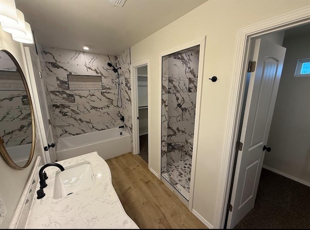 5000 SE 85th St, Oklahoma City, OK 73135 - full bath featuring wood finished floors, vanity, and shower / tub combination