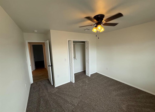 5000 SE 85th St, Oklahoma City, OK 73135 - unfurnished bedroom with dark carpet, baseboards, a closet, and ceiling fan