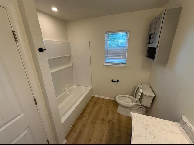 5000 SE 85th St, Oklahoma City, OK 73135 - full bath with wood finished floors, toilet, baseboards, vanity, and recessed lighting