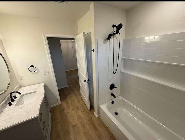 5000 SE 85th St, Oklahoma City, OK 73135 - full bath featuring wood finished floors, vanity, and shower / washtub combination