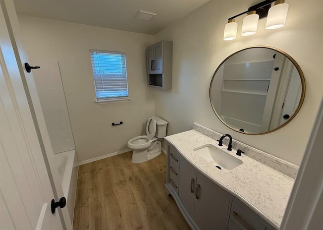 5000 SE 85th St, Oklahoma City, OK 73135 - bathroom with vanity, wood finished floors, toilet,  shower combination, and baseboards