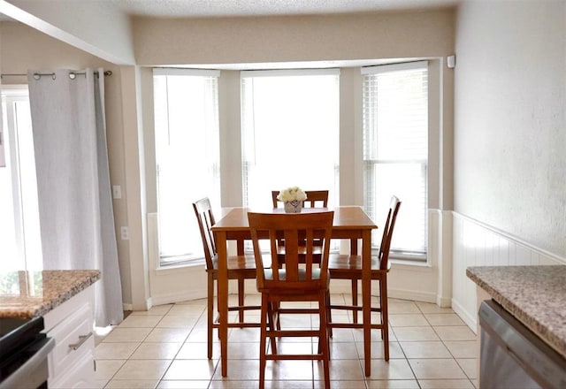 3012 SE 55th St, Oklahoma City, OK 73135 - dining area with light tile patterned floors