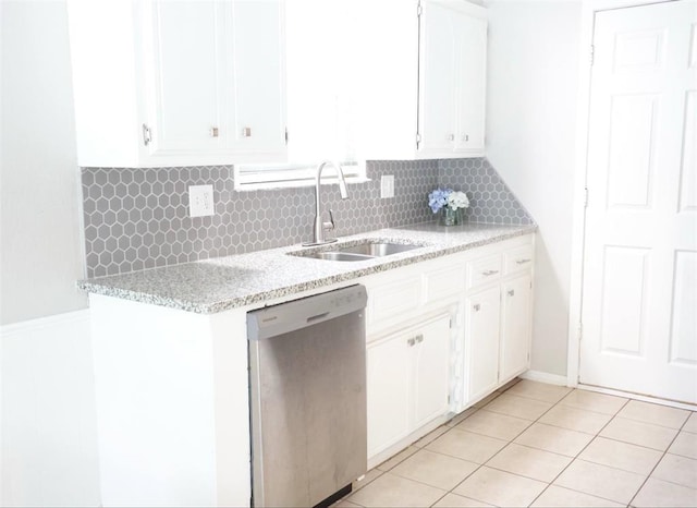 3012 SE 55th St, Oklahoma City, OK 73135 - kitchen with stainless steel dishwasher, a sink, white cabinets, and tasteful backsplash