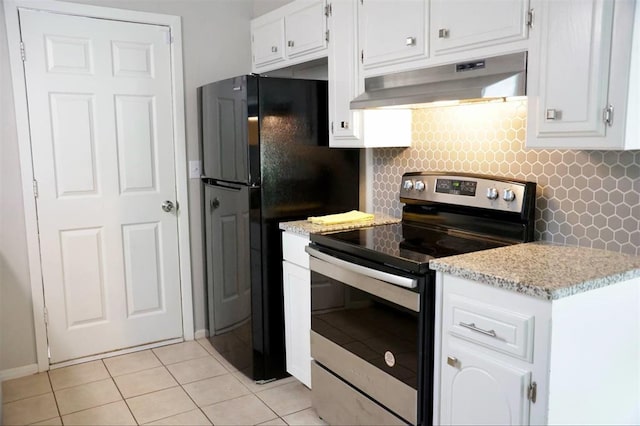 3012 SE 55th St, Oklahoma City, OK 73135 - kitchen with stainless steel electric range, under cabinet range hood, tasteful backsplash, white cabinets, and light tile patterned floors