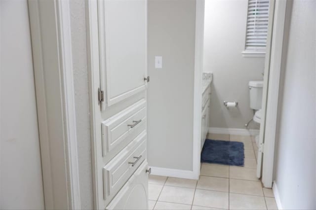 3012 SE 55th St, Oklahoma City, OK 73135 - bathroom with toilet, tile patterned flooring, vanity, and baseboards
