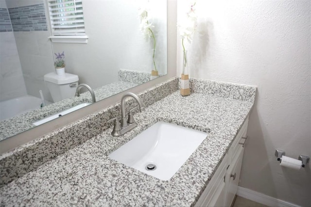 3012 SE 55th St, Oklahoma City, OK 73135 - full bathroom with vanity, toilet, and shower / washtub combination