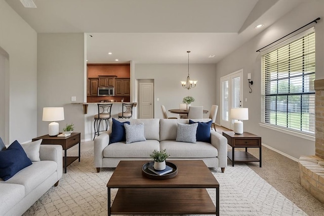 2900 Coventry Manor Dr, Oklahoma City, OK 73128 - living room featuring a chandelier, baseboards, light colored carpet, and recessed lighting