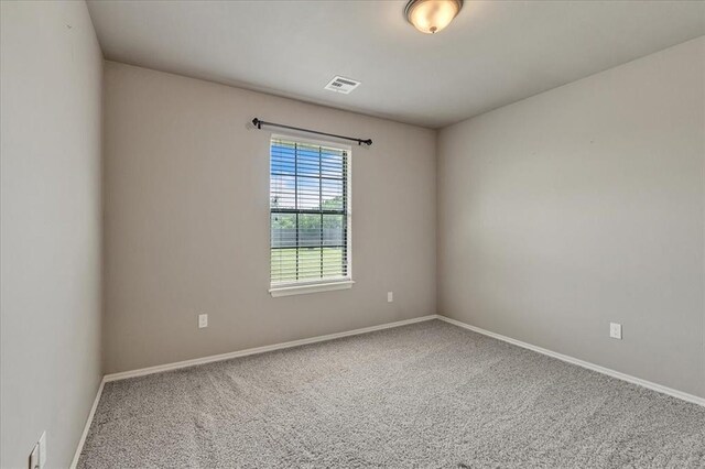 2900 Coventry Manor Dr, Oklahoma City, OK 73128 - carpeted empty room featuring baseboards