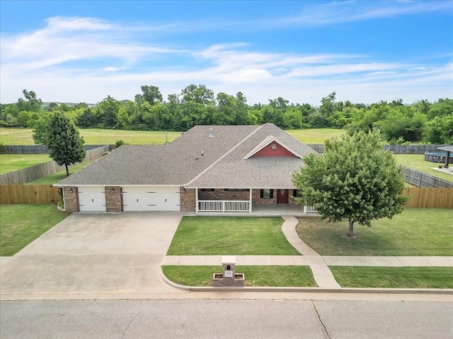 2900 Coventry Manor Dr, Oklahoma City, OK 73128 - view of front facade with a garage, brick siding, driveway, a porch, and roof with shingles