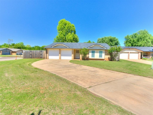 625 Jasmine Pl, Edmond, OK 73003 - ranch-style house with concrete driveway and a garage