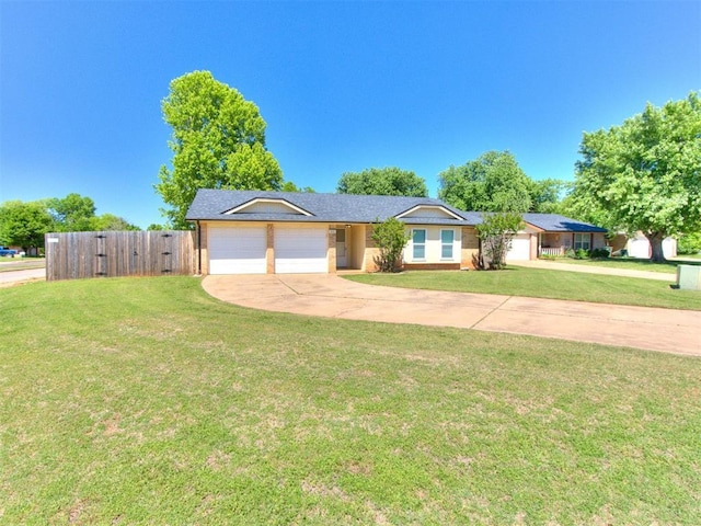 625 Jasmine Pl, Edmond, OK 73003 - ranch-style home featuring driveway and an attached garage