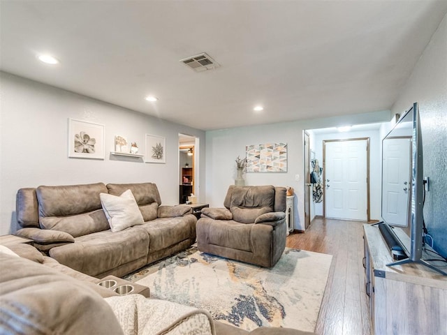 625 Jasmine Pl, Edmond, OK 73003 - living room with light wood-style floors and recessed lighting