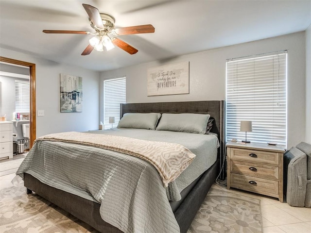 625 Jasmine Pl, Edmond, OK 73003 - bedroom with light tile patterned flooring and a ceiling fan