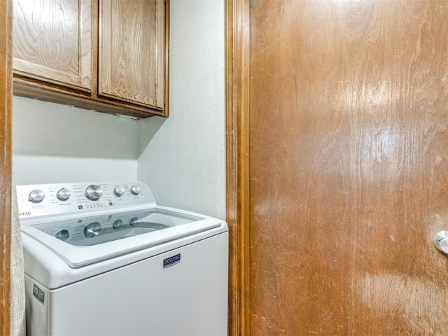 625 Jasmine Pl, Edmond, OK 73003 - laundry area featuring washer / dryer and cabinet space