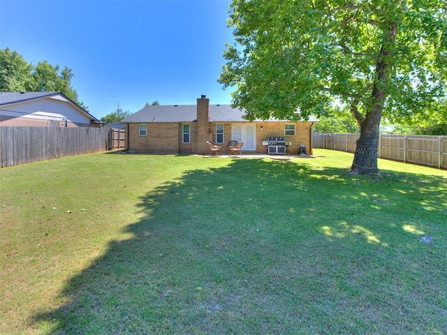625 Jasmine Pl, Edmond, OK 73003 - view of yard with a patio area