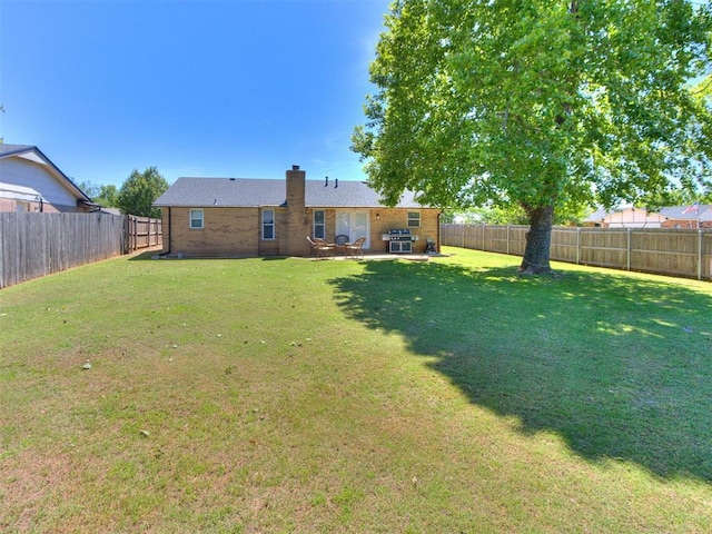 625 Jasmine Pl, Edmond, OK 73003 - view of yard with a patio area
