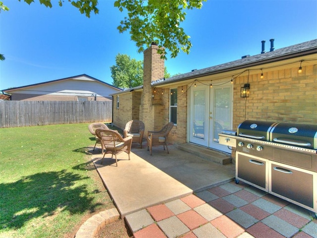 625 Jasmine Pl, Edmond, OK 73003 - view of patio / terrace featuring french doors
