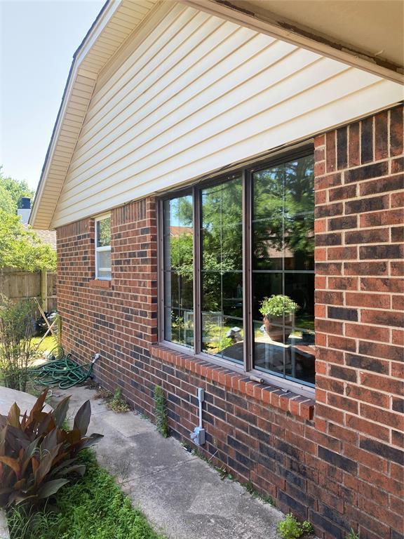 308 Jeffrey Laird Pl, Moore, OK 73160 - view of property exterior featuring brick siding