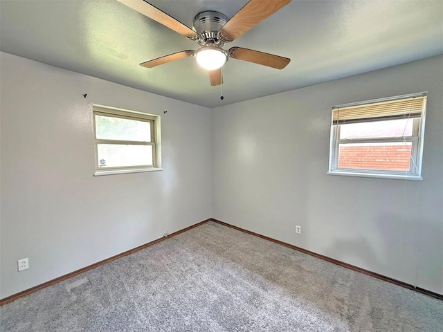 2405 S Mansfield St, Del City, OK 73115 - unfurnished room featuring carpet flooring, baseboards, and a ceiling fan