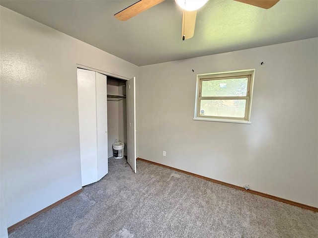 2405 S Mansfield St, Del City, OK 73115 - unfurnished bedroom featuring carpet, baseboards, a closet, and a ceiling fan