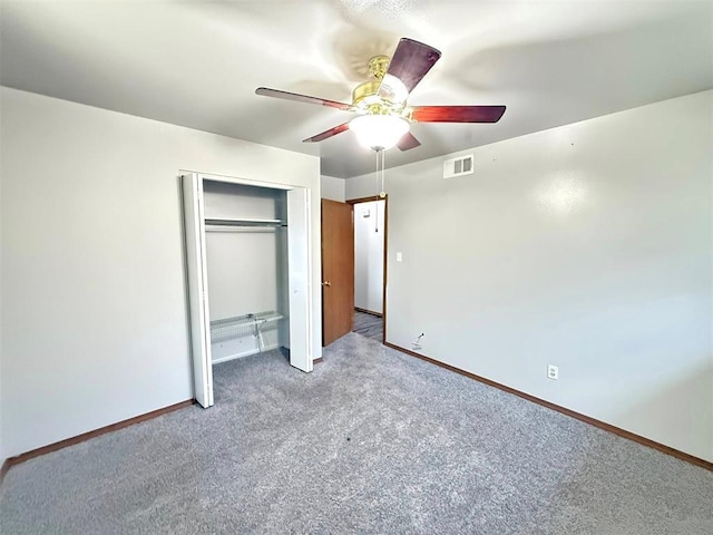 2405 S Mansfield St, Del City, OK 73115 - unfurnished bedroom with carpet, baseboards, a closet, and a ceiling fan